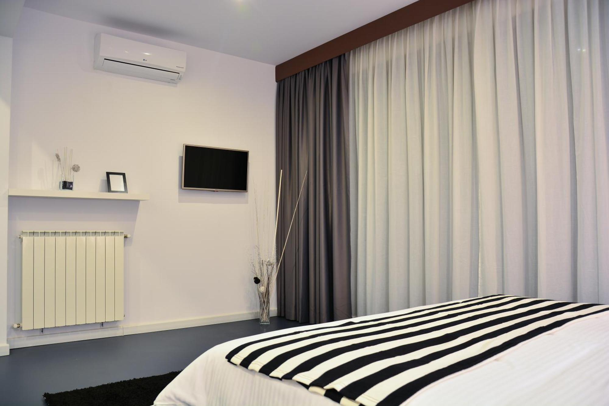 Living Aparthotel Bukarest Zimmer foto